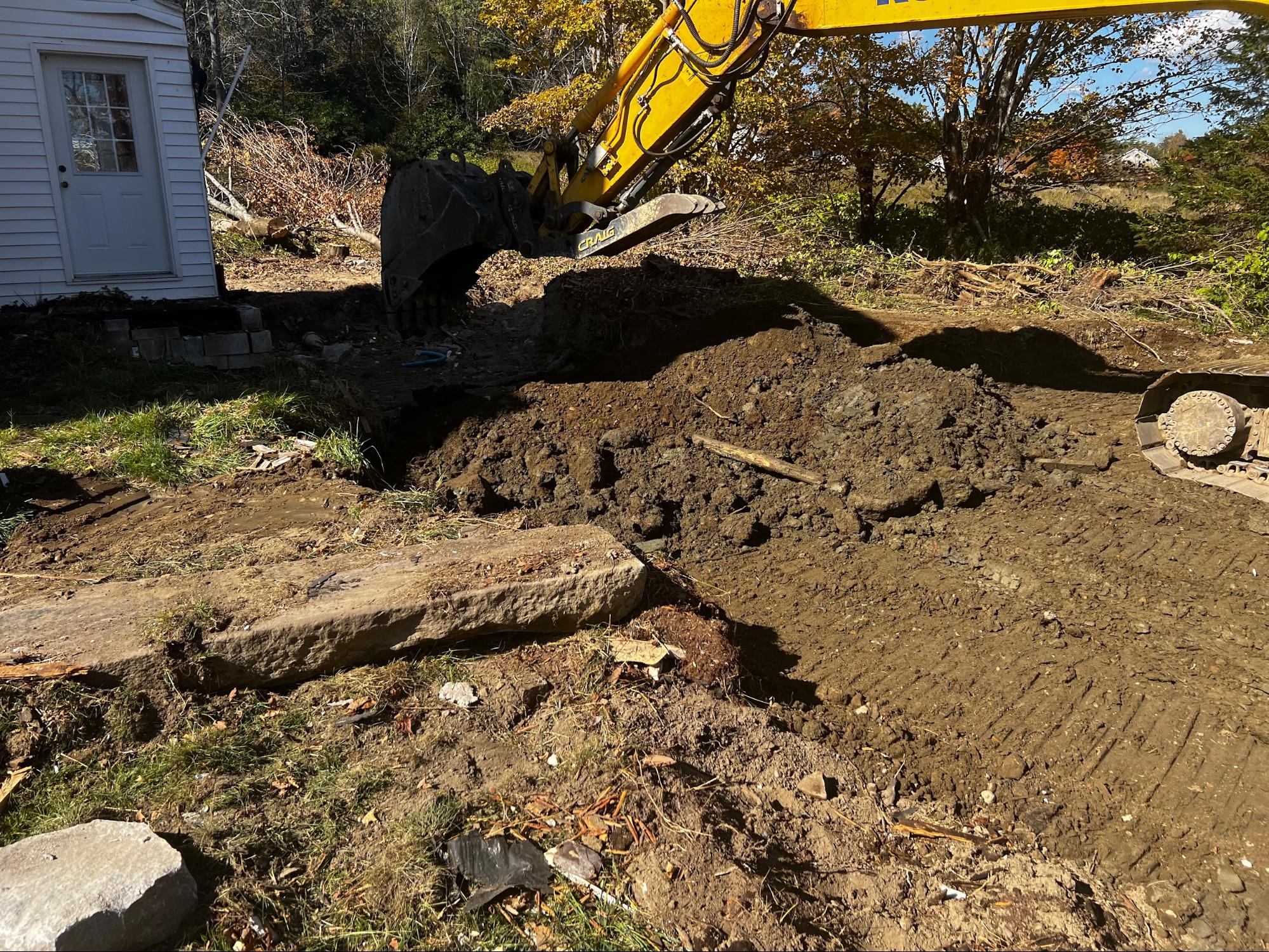 Excavator digging out foundation